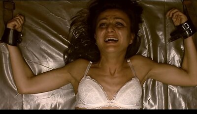 Tying up a woman and refusing to release her